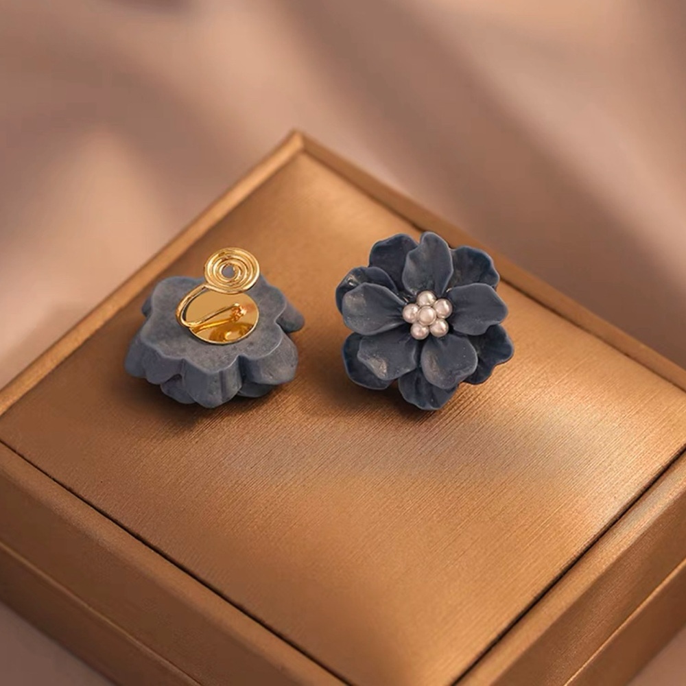 Blue flower ear clips